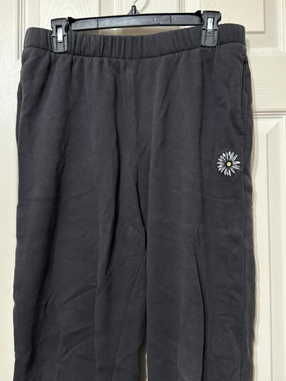 Hollister Black ultra high rise sweatpants with white embroidered flower design